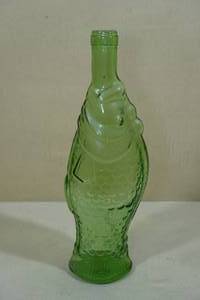 lot 209 image: Green Glass Fish Bottle