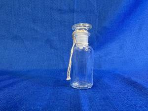 lot 10 image: 36 - 40ml NM Bottle With Caps