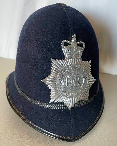 lot 29 image: Vintage United Kingdom British Metropolitan Policemans Bobby Hat 