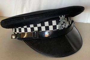 lot 30 image: Vintage United Kingdom British Metropolitan Police Hat