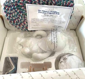 lot 35 image: 2000 Pillsbury Doughboy Recipe Time Porcelain Doll by Danbury Mint