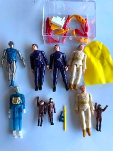 lot 124 image: Lot of Vintage Action Figres- MicroNauts,  BattleStar Galactica,  Zylmex Metalman Radon