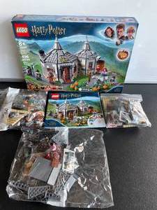 lot 138 image: LEGO Harry Potter Hagrids Hut Buckbeaks Rescue #75947