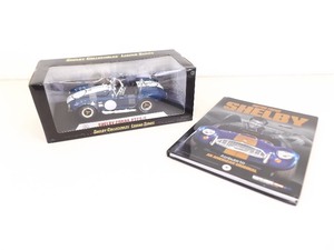 lot 20 image: NRFB MINT CONDITION 118 Die Cast Signed Shelby Collectibles Cobra and Book