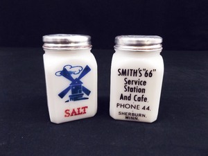 lot 82 image: Vintage Milk Glass Phillips 66 Advertising Salt and Pepper Shakers