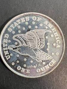 lot 34 image: 1 TROY OZ .999 FINE SILVER STATUE OF LIBERTY ROUND