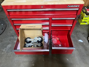 lot 40 image: Husky 42 in. W x 18.1 in. D 8-Drawer Red Mobile Workbench Cabinet with Solid Wood Top