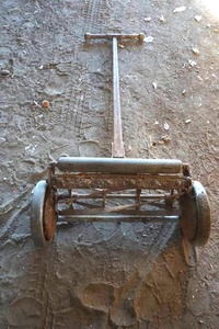 lot 34 image: antique non motorized lawn mower