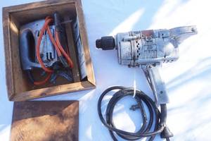 lot 56 image: vintage Thor 12 drill and Black and Decker jig saw