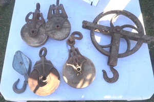 lot 135 image: antique wooden pulleys, and 14 rail pulley
