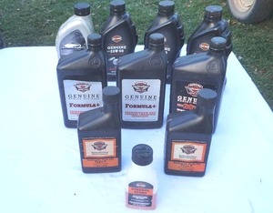 lot 163 image: Harley Davidson oil and fork oil
