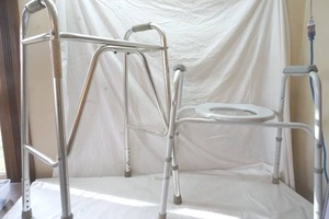 lot 340 image: walker and portable commode