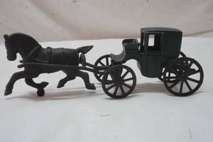 lot 402 image: cast iron horse and buggy