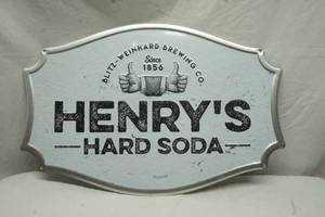 lot 507 image: Henrys Hard Soda tin sign