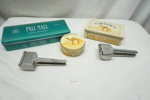 lot 524 image: cigarette tins and ice crushers
