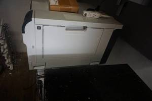 lot 54 image: HP Model CP5225 Colored Laser Jet Printer With Stainless Steep Stand