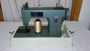 Thompson Sewing Machine With Case.