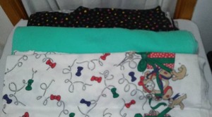 Sweatshirt. Blk With POK-A-Dot, Teal, And Presents
