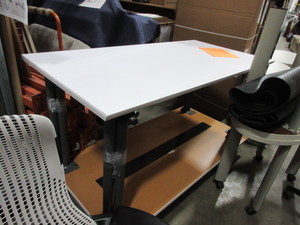 lot 776 image: LAMINATE TOP WORK TABLES WITH WHEELS