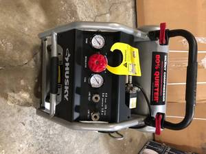 Husky 4.5 Gal. Portable Electric-Powered Silent Air Compressor    Customer Returns See Pictures