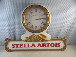 lot 1 image: (F-1) Large Stella Artois Wall Clock 32 W x 24 H