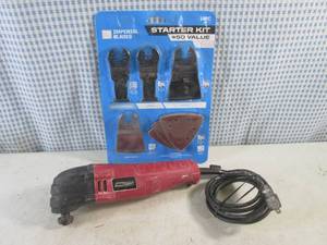 lot 67 image: (BS) Tool Shop Multi-Function Tool with New 14pc Blade Starter Kit