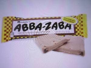 lot 185 image: (B-2) Box of 24 Abba-Zaba Chewy Taffy with Chocolate Peanut Butter Center Candy Bars Best by Oct 2023