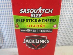 lot 200 image: (B-3) Box of 12 Jack Links Sasquatch Size Jalapeno Beef Stick & Cheese Best by Nov 2023