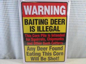 lot 293 image: (EC1) Baiting Deer Is Illegal Tin Sign - Embosed with Rolled Back Edges - New in Wrap - 12 x 16 34