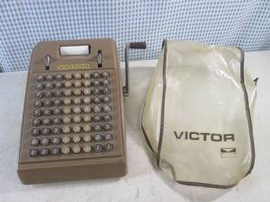 lot 310 image: (CSB) Vintage Victor Adding Machine with Cover