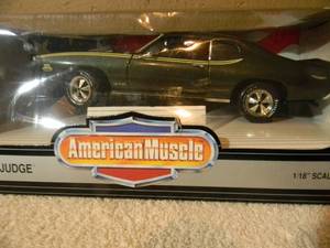 lot 11 image: ERTL, AMERICAN MUSCLE 118 SCALE 1969 PONTIAC GTO JUDGE - COLLECTORS EDITION - IN BOX - AWESOME PIECE - SEE PICTURES