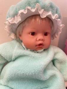 lot 128 image: Lee Middleton Newborn Wonder Play Doll - Green