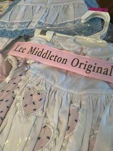 lot 104 image: Lee Middleton & Other Doll Clothes