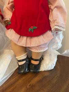 lot 120 image: Lee Middleton Christmas Dolls Pair