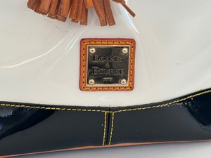 lot 34 image: Vintage Dooney and Bourke Patent Leather Drawstring Hobo