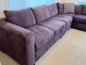 lot 25 image: Microfiber Eggplant Upholstered Sectional