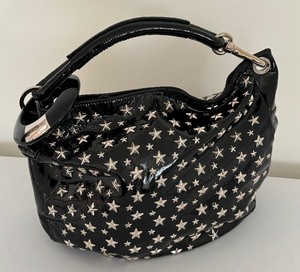 lot 23 image: Vintage Jimmy Choo Black Patent Leather Star Studded Large Hobo Bag