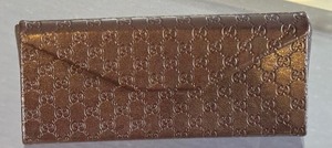 lot 62 image: Gucci Sunglass Case