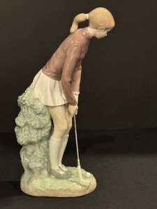 lot 76A image: Lladro Female Golfer Porcelain Figurine 4851