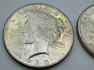 lot 300 image: (2) 1925 United States Peace Dollar Coins