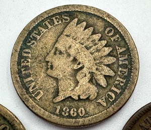 lot 296 image: 1863 United States Indian Head Penny, 1894 United States Indian Head Penny and 1860 United States Indian Head Penny