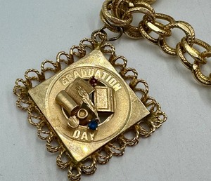 lot 82C image: Vintage 14k Gold Bracelet with Two 14k Gold Charms