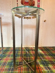 lot 150 image: KNOLL Brushed Brass Finish Tall Pedestal Glass Top Table