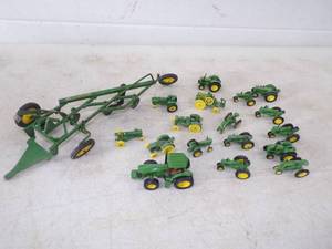 lot 119 image: Vintage Metal John Deere Plow and Small John Deere Tractors
