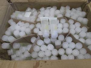 lot 83 image: Box of 1 oz Eco Shower Gels...