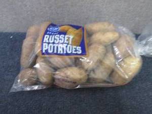 lot 86 image: 10 lb Russet Potatoes...