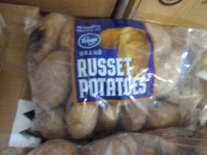 lot 87 image: 10 lb Russet Potatoes...