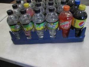 lot 96 image: 24- 16.9 oz Bottles Assorted Pop...