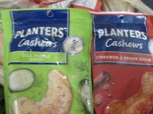 lot 121 image: 6- 5 oz Assorted Planters Cashews...
