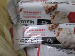 lot 134 image: 12 Keloggs Protein Bars...